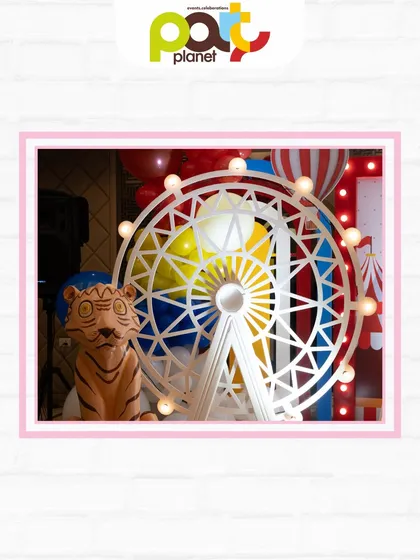 A detailed prop of a Ferris wheel with a friendly tiger, adding a touch of whimsy and fun to a carnival party setup.