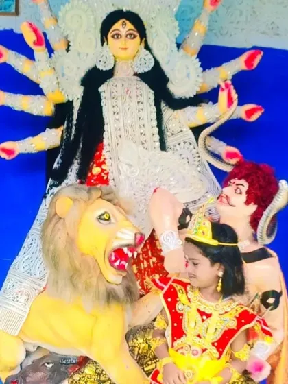 Here the child is posing with a full Durga idol setup. My costumes are designed to look authentic and help children feel part of the festive stories and traditions.