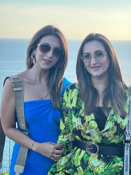 Another photo with my sister by the sea. Our vacation styles are always in sync.