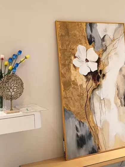Beyond wall murals, I also create custom 3D paintings on canvas. This piece features a sculpted flower on a textured background with gold leaf accents, offering a beautiful, movable piece of art for any space.