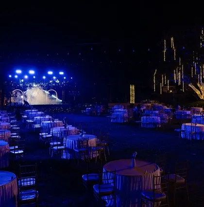 The Sangeet stage is set for a night of celebration. The cool blue lighting, smoke effects, and a sky full of twinkling lights created an electrifying atmosphere for the performances fatores.