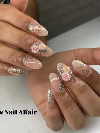 An elegant and romantic design with 3D roses, silver glitter, and rhinestone accents on a nude base.