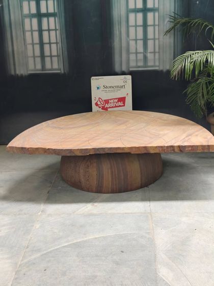 A side profile of our modern stone bench, highlighting its clean lines and the beautiful grain of the sandstone. It measures 4 feet in length, providing comfortable seating.