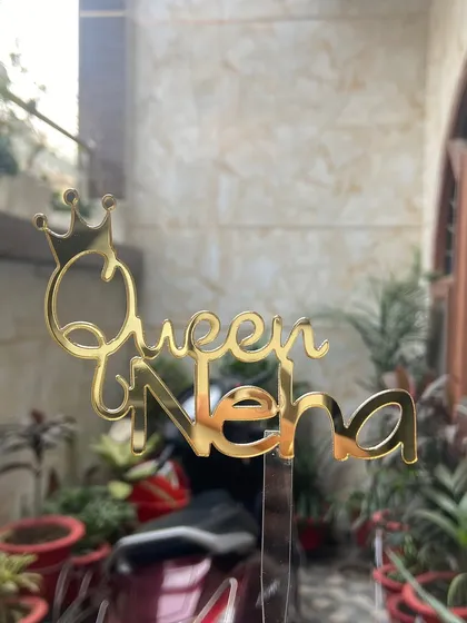 For the queen in your life! This "Queen Neha" topper with a crown detail is a fun and empowering design for any birthday.