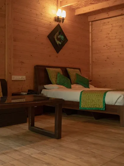 The interior of one of my cozy wooden chalets, offering a rustic and warm retreat after a day of adventure.