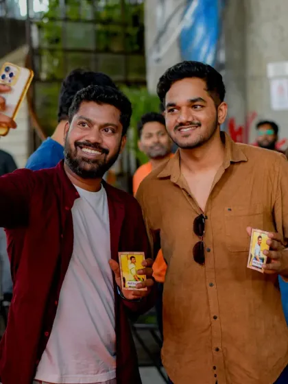 Two guys who met at Let's Jam, posing for a selfie. It's a great place to network and find like-minded people.