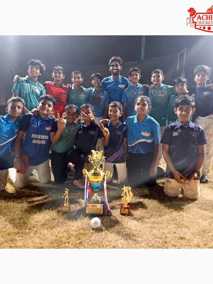 Posing with the silverware. Our U-11 team shows off their well-deserved trophy.
