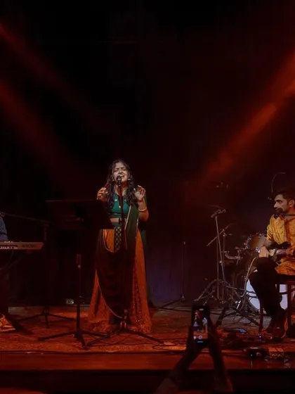 Performing at The Piano Man in New Delhi, a legendary jazz club. This shows how we adapt our Carnatic fusion sound for a more intimate setting, blending soulful melodies with a cool, contemporary vibe.