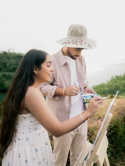 A moment of collaboration and connection during their artistic pre-wedding session. I encourage couples to interact naturally, letting their true personalities shine through.