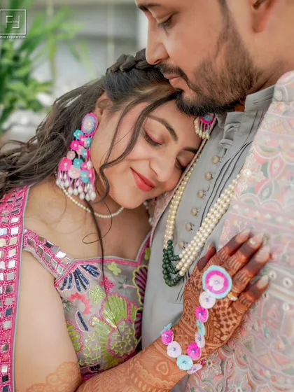 The quiet moments in between the chaos are often the most powerful. Here, I captured a bride finding a moment of peace and affection with her partner during their Mehendi ceremony. It’s this gentle, unspoken connection that I aim to preserve forever.