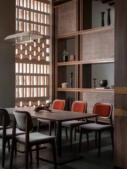 Attention to detail is everything in hospitality design. This private dining nook at Ishtaa showcases our use of layered textures, from the terracotta jaali screen filtering light to the woven cane partitions and custom upholstered seating, creating a rich, tactile experience.