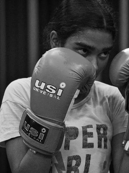 Boxing isn't just for boys. We train fierce female fighters, teaching them to keep their guard up and their eyes on the prize. The ring doesn't care about gender, only about heart.