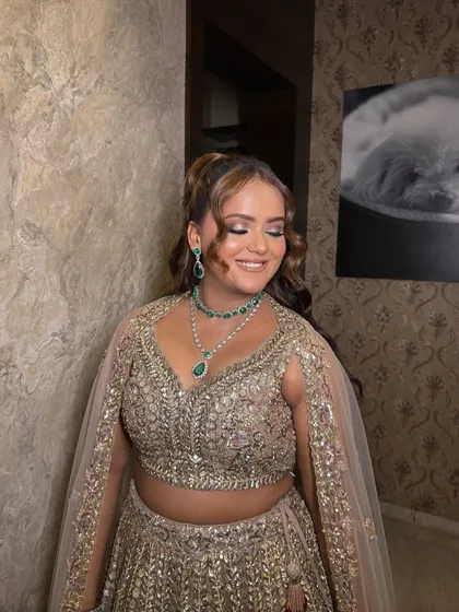 My special girl Kiara, looking absolutely stunning for her engagement. We created a glamorous look with a smokey eye and a flawless base, paired with a high ponytail to show off her beautiful emerald jewelry.