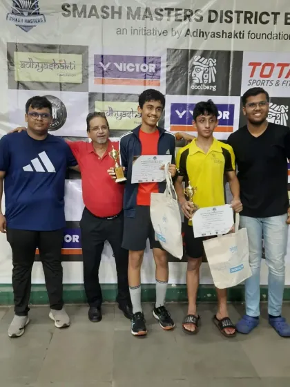 Zehn Masani with his coach and fellow competitors after winning the BS U17 championship and finishing as runner-up in the BS U19 category.