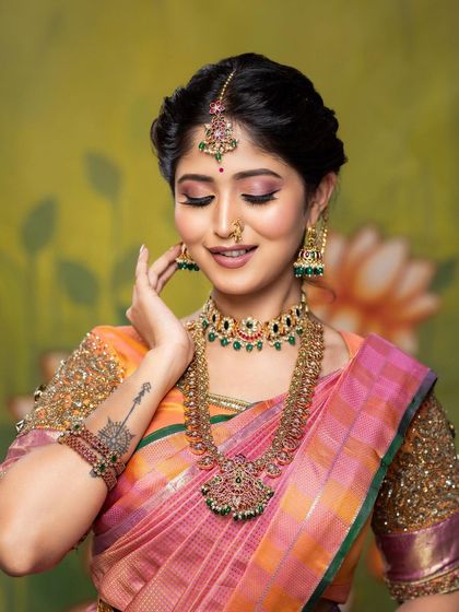 A beautiful, serene expression captured up close. This image showcases the smooth, dewy finish of the skin and the delicate shimmer on the eyelids.