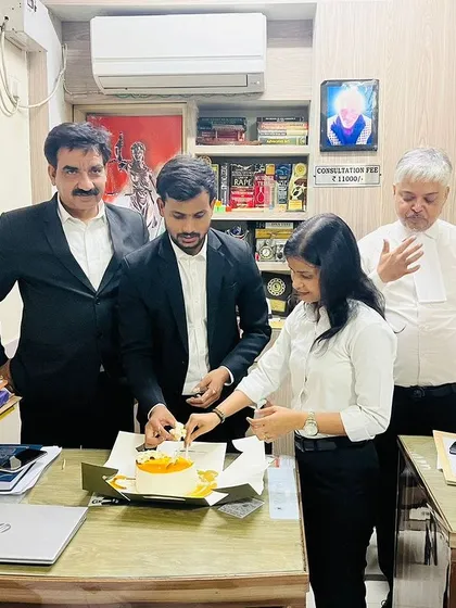 A moment of celebration for a colleague's birthday in my law office. Building a supportive team is crucial for the demanding work of criminal law.