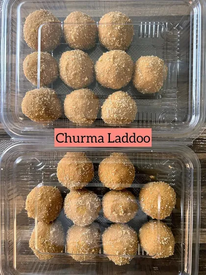 Boxes of traditional Churma Laddoos, made with love.