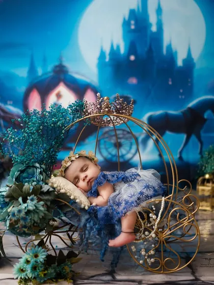 A real-life Cinderella sleeping peacefully in her magical carriage before the clock strikes twelve. Creating these elaborate, dreamy newborn portraits is a passion of mine, turning a fleeting moment into a timeless work of art.