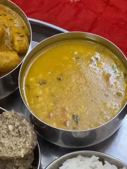 A bowl of our classic Rajasthani Dal, slow-cooked with aromatic spices, the perfect accompaniment for Baati.