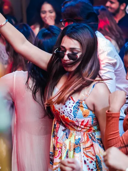 Dancing with style at 'Mondaze'. The vibe is a unique mix of Indian rhythms and electronic beats.