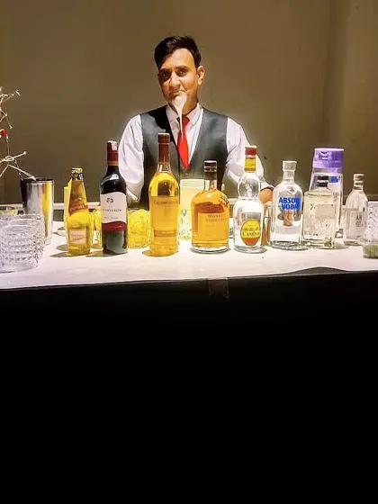 A compact bar setup perfect for a house party. My experienced bartenders can create a professional bar experience in any space, serving a variety of drinks to keep your guests happy.