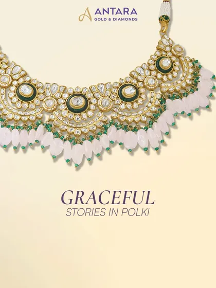 This Polki necklace tells a graceful story, embodying happiness and elegance. The design features intricate enamel work and is fringed with soft pink and green beads, capturing the beauty of your journey.