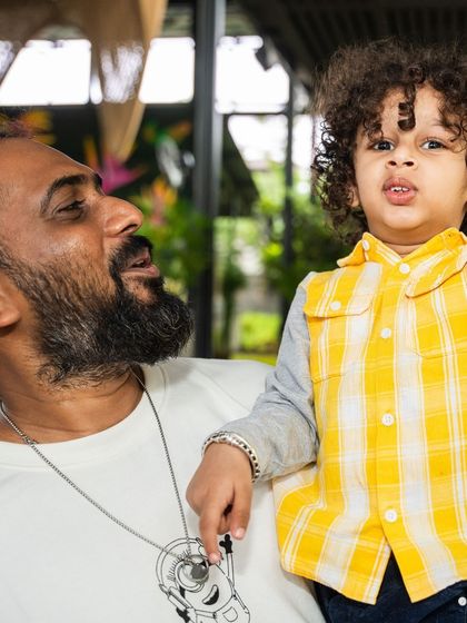 A father and son sharing a special moment. My venue is a place for families to connect and create lasting memories.