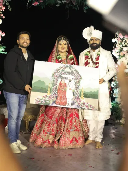Presenting the finished canvas to the happy couple in Mahabaleshwar. Their smiles are our biggest reward.