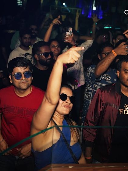 The crowd is fully engaged, with hands in the air, dancing to the beat. I curate nights that are all about high energy and a passionate love for music.