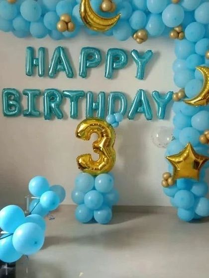 The complete setup for the 3rd birthday, showing the foil number and "Happy Birthday" balloons.