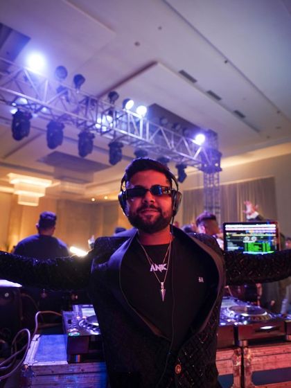 Arms open, embracing the energy of the room. This is me in my element, connecting with the crowd.