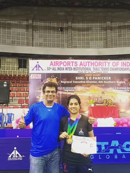 Posing with Swastika after she won two Bronze medals at the 50th All India Inter-Institutional Table Tennis Championships. Success in both team and doubles events shows her versatility as a player.