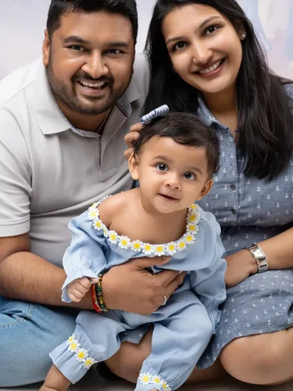 A bright and joyful family portrait. We capture the happy energy of families with young children, ensuring everyone is smiling and looking their best for the camera.