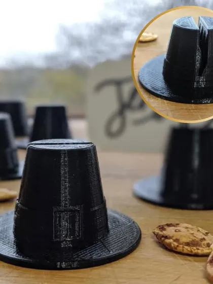 These quirky black hat-shaped place card holders add a fun and unexpected element to your table. They are great for themed parties or for anyone with a playful sense of style.