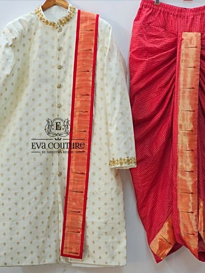 A classic men's kurta and dhoti set. The off-white silk kurta has delicate butti work and is paired with a red dhoti featuring a pure Paithani border.