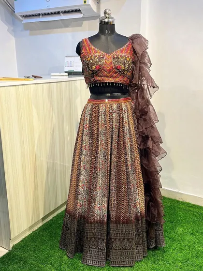 The full look of the brown lehenga set. This is a great rental option if you're looking for something traditional yet unique for a wedding function.