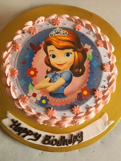 A sweet strawberry-flavored cake featuring Sofia the First. Photo print cakes are a great way to include a child's favorite character in a simple and affordable design.