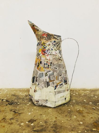 This is a work-in-progress photo of a paper-mache jug covered in newspaper. It made me think about how water stores information and whether it could be a purer source of news than the media.