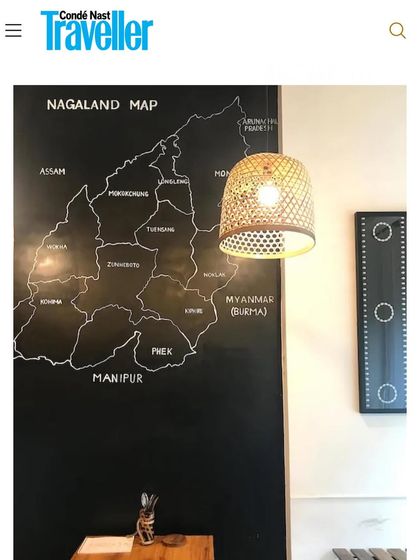 The Condé Nast Traveller article featuring a photo of our restaurant's interior with the map of Nagaland. It was an honor to be recognized by such a prestigious publication.