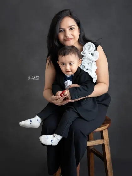 A sweet mother and son portrait. The little boy looks so handsome in his tiny tuxedo, ready for his formal photoshoot.