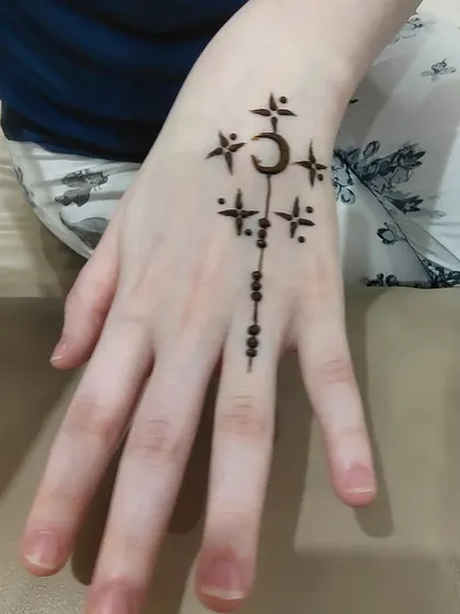 Sometimes, less is more. This minimalist henna design was created for a client who wanted something simple yet symbolic, showing that beautiful henna art comes in all sizes.