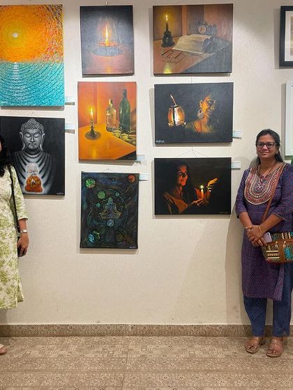 With friends and family at the Vasantha Arts exhibition, standing by my displayed works.