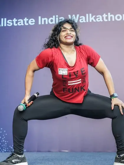 Fitness should also be fun, and my Zumba sessions are pure energy. Here I am leading a warm-up at the Allstate India Walkathon, bringing the fire and getting everyone moving. We dance, we sweat, and we feel alive.