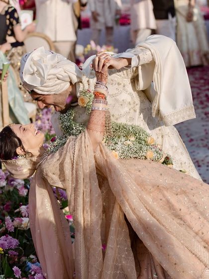 A playful dip and a shared laugh make for the best memories. I always encourage my couples to be themselves, and I design the flow of the event to allow for these spontaneous, happy moments to happen naturally.