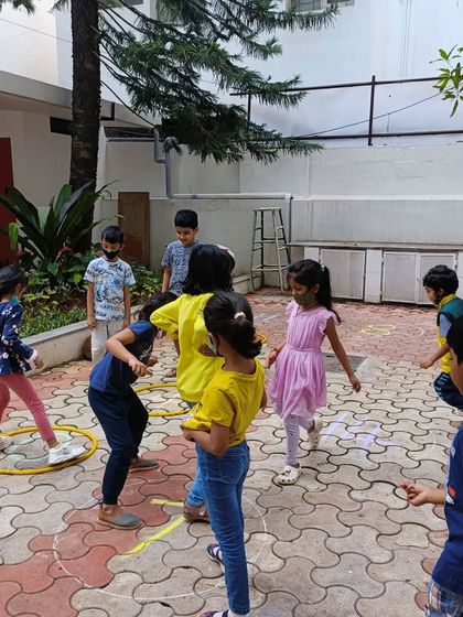 A mathemagical Saturday in action! Kids are having fun with numbers through active games inspired by the book 'One is a Snail, Ten is a Crab'.