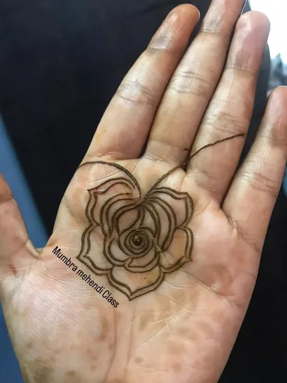 The very first step: a simple rose outline. Every great design starts with a confident line.