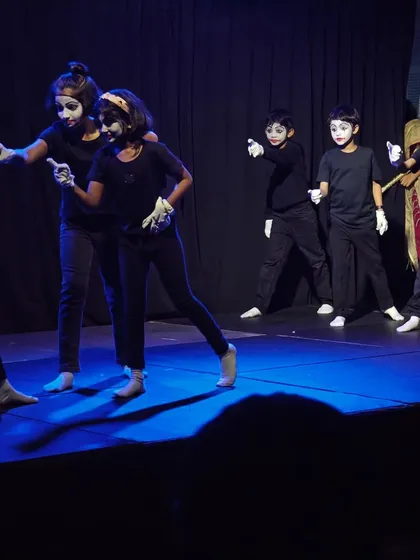 Expressing without words. Students in our children's theatre program learn the art of mime, developing physical expression and non-verbal communication skills. It's amazing to see them command the stage with just their movements and expressions.
