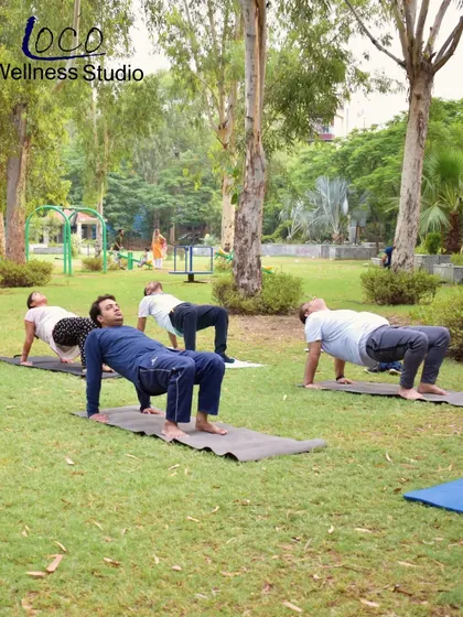 The reverse tabletop pose is an excellent way to strengthen the back, glutes, and arms while opening up the chest and shoulders. It's a staple in our group yoga classes.