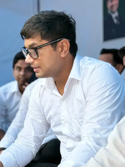 In deep thought during a meeting. Every case, whether it's a bail hearing or a child custody matter, requires careful strategy and attention to detail.