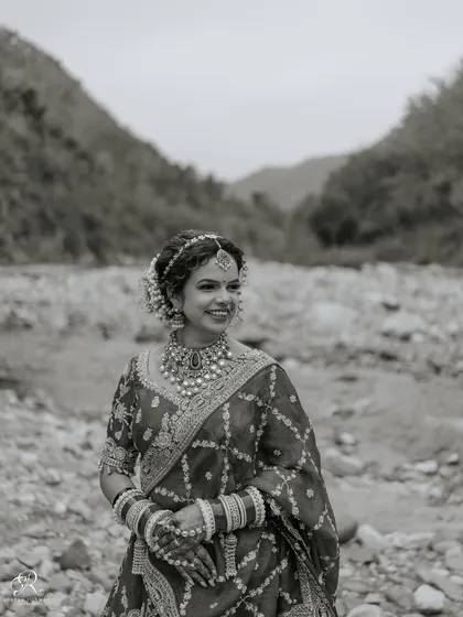 A timeless black and white portrait of the bride, showcasing her elegance and happiness.